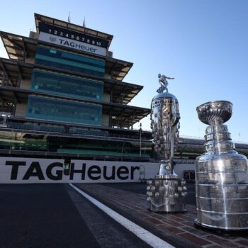 The-Borg-Warner-Trophy-and-the-Stanely-Cup-on-the-famed-Yard-of-Bricks-PPG-Presents-Armed-Forces-Qualifying-By_-Joe-Skibinski_Ref-Image-Without-Watermark_m81222